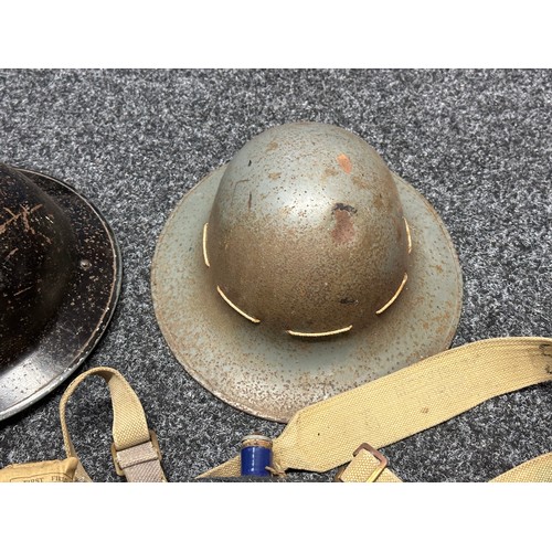 3201 - A collection of WW2 British militaria to include:, Fire Warden steel helmet, Fire Guard steel helmet... 