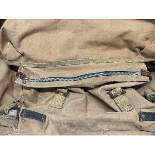 3205 - WW2 British Bergan Rucksack in tan webbing, dated 1942. Complete with all straps and working zip fas... 