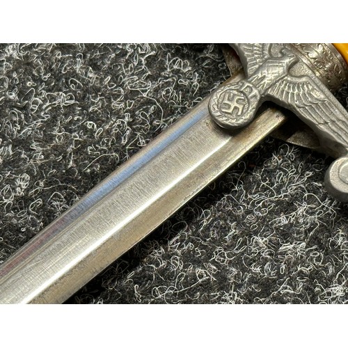 3288 - WW2 Third Reich Heer Officers Dagger with double edged blade 255mm in length, no makers mark. Red fe... 