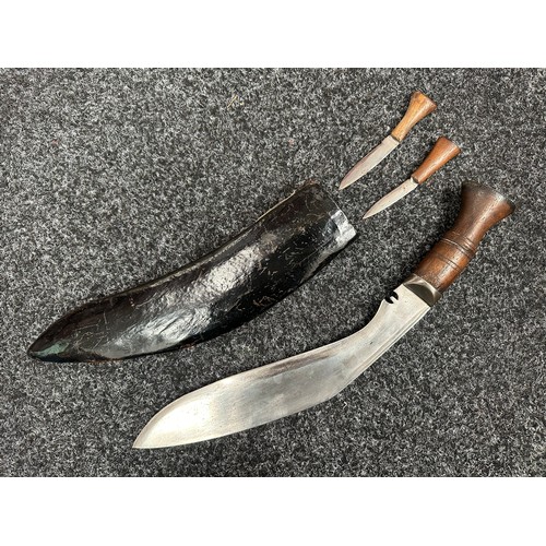 3297 - Gurhka Kukri knife with single edged blade 290mm in length, no makers mark. Wooden grips. Steel pomm... 