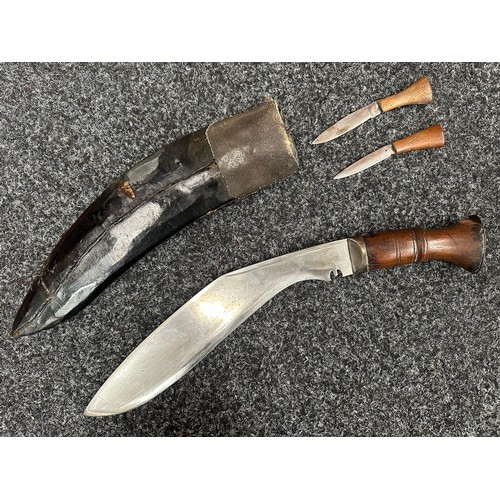 3297 - Gurhka Kukri knife with single edged blade 290mm in length, no makers mark. Wooden grips. Steel pomm... 