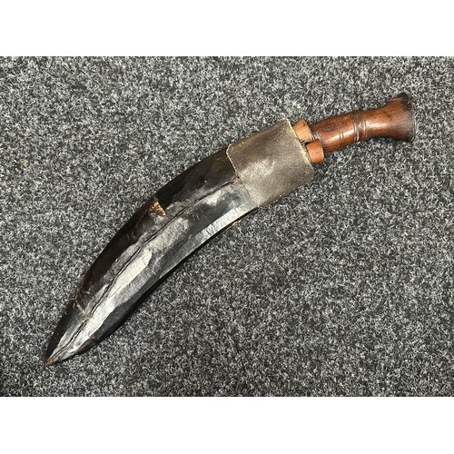 3297 - Gurhka Kukri knife with single edged blade 290mm in length, no makers mark. Wooden grips. Steel pomm... 