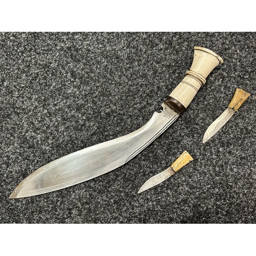 3306 - Kukri knife with single edged blade 285mm in length, Bone grip, overall length 385mm. Complete with ... 