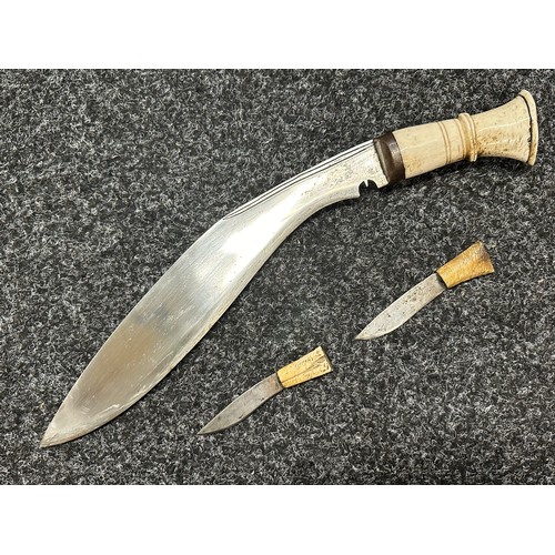 3306 - Kukri knife with single edged blade 285mm in length, Bone grip, overall length 385mm. Complete with ... 