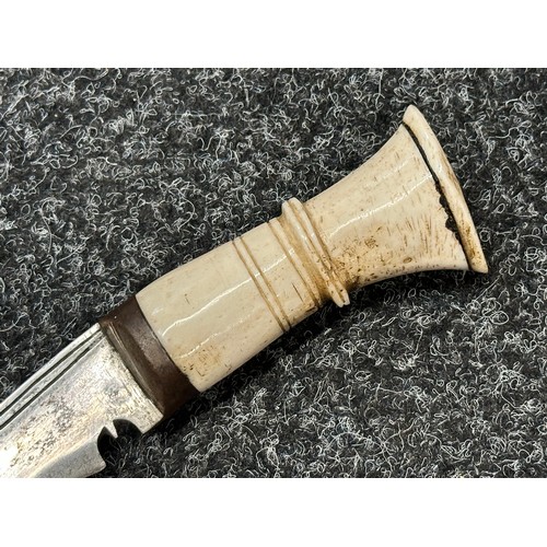 3306 - Kukri knife with single edged blade 285mm in length, Bone grip, overall length 385mm. Complete with ... 