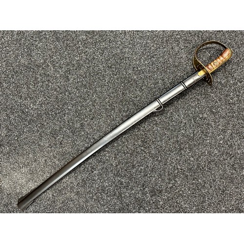 3307 - Sword with single edged fullered blade 907mm in length, marked 