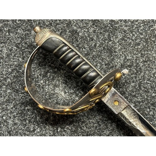 3311 - Reproduction Victorian British Officers Sword with  singled edged fullered plated and etched blade w... 