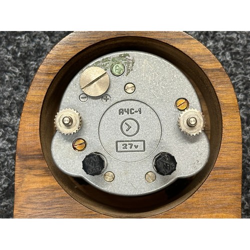 3314 - A Soviet Airforce cockpit clock. Electricly powered.  Mounted in a wooden case. Overall height 244mm... 