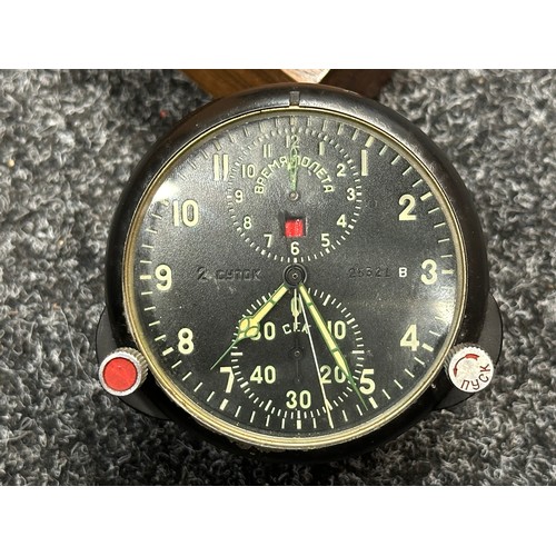 3314 - A Soviet Airforce cockpit clock. Electricly powered.  Mounted in a wooden case. Overall height 244mm... 