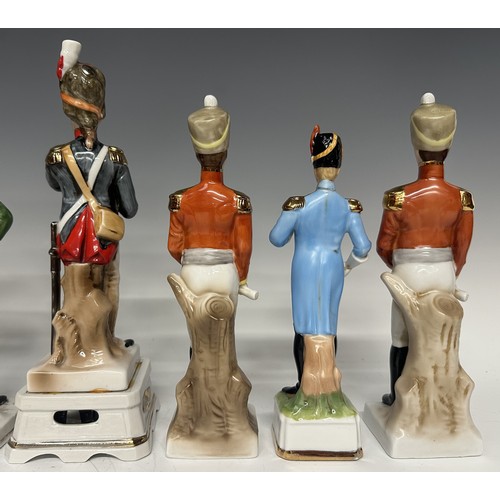 3320 - A set of eight continental ceramic French military figurines of the Napeoleonic Era. Average height ... 