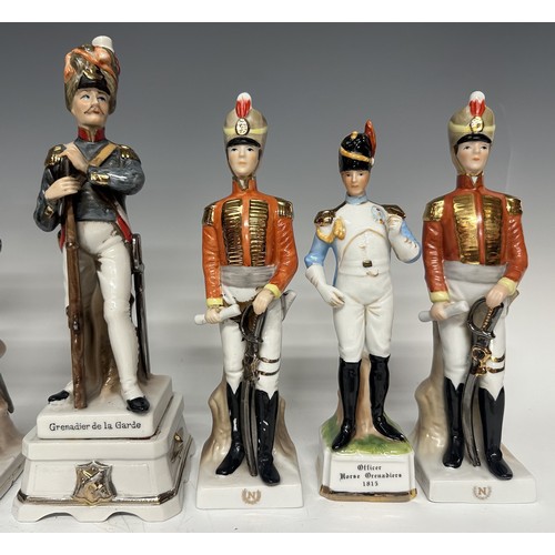 3320 - A set of eight continental ceramic French military figurines of the Napeoleonic Era. Average height ... 