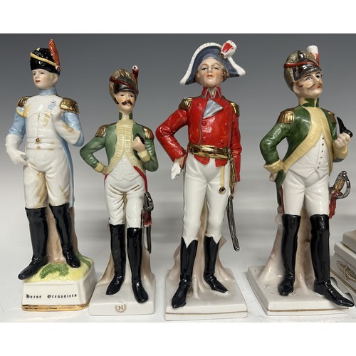 3320 - A set of eight continental ceramic French military figurines of the Napeoleonic Era. Average height ... 