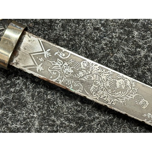 3322 - Scottish Dirk with double edged etched blade decorated with Thistles, 285mm in length. No makers mar... 