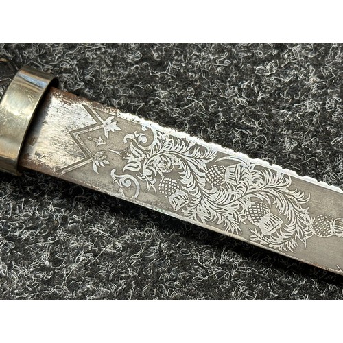 3322 - Scottish Dirk with double edged etched blade decorated with Thistles, 285mm in length. No makers mar... 