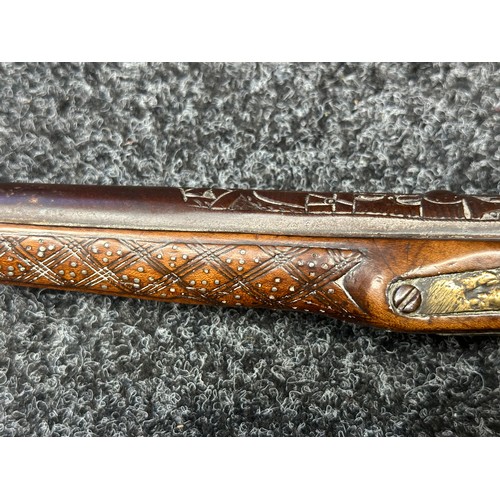 3355 - Flintlock pistol with 220mm long barrel with cast decoration. Bore approx. 17mm. Action not working.... 