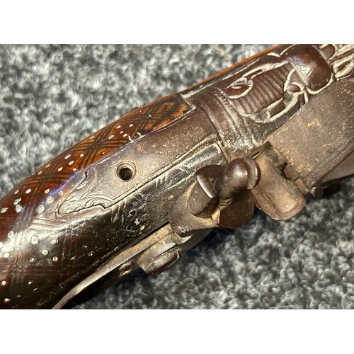 3355 - Flintlock pistol with 220mm long barrel with cast decoration. Bore approx. 17mm. Action not working.... 