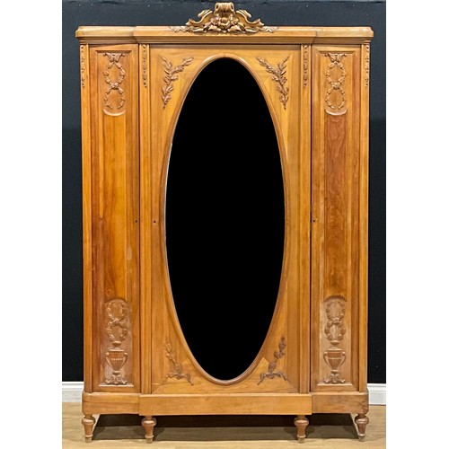 106 - A French Provincial design armoire, in the vernacular Louis XVI taste, central door set with bevelle... 