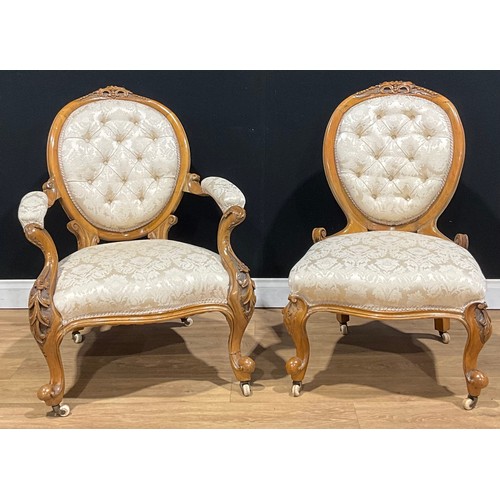 119 - A pair of Victorian walnut drawing room chairs, the armchair 92cm high, 72cm wide, the seat 61cm dee... 