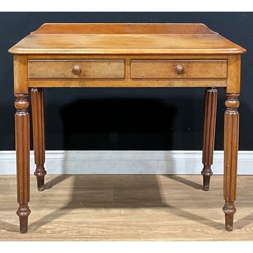 205 - A Victorian mahogany side table, shallow half-gallery above a pair of frieze drawers, turned and ree... 