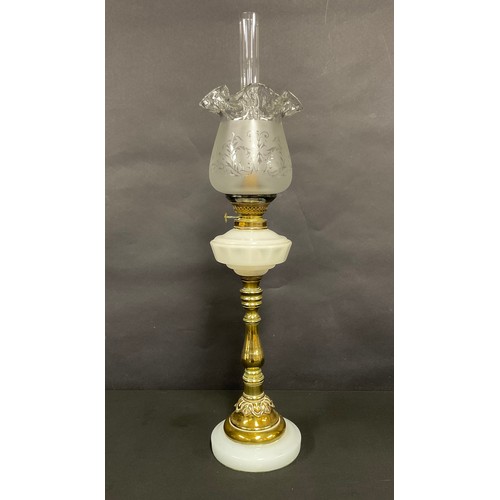 356 - A late 19th/early 20th century oil lamp, faceted opaque glass font, brass baluster column, opaque gl... 