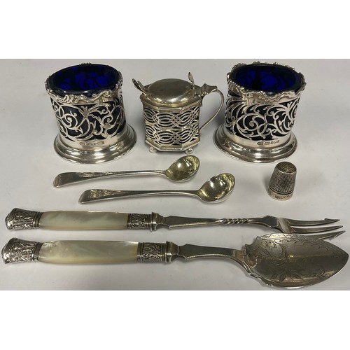 374 - A pair of silver salts, blue glass liners; two silver salt spoons; a silver lidded mustard; etc (qua... 