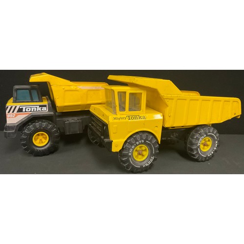 378 - Toys & Juvenalia - a Mighty Tonka XMB 975 dumper truck, 26cm high, 48cm long; another similar, 952 (... 