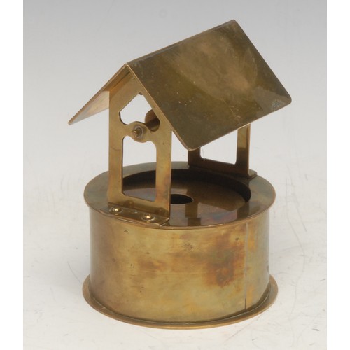 476 - An unusual trench art type musical model, of a well, Swiss movement, no.81418, early 20th century