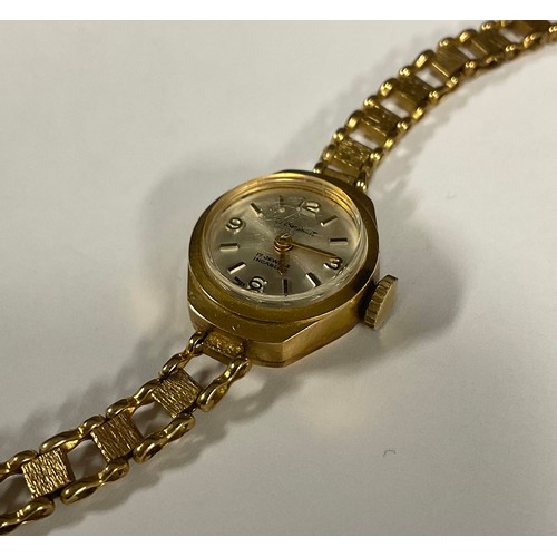 490 - A Le Cheminant 9ct gold cased lady's bracelet watch, manual wind movement, with fancy link 9ct gold ... 