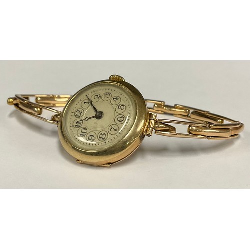 492 - A lady's 9ct rose gold watch, Arabic numerals, integral 9ct gold expanding bracelet strap, marked 9c... 