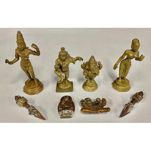 511 - Four Sino/Tibetan bronze figures; bronze and silvered (8)