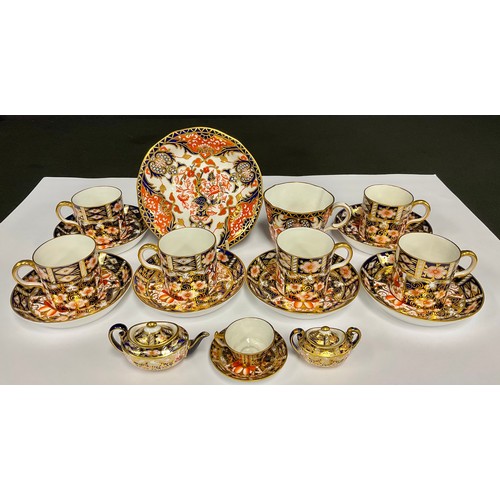 85 - A set of six Royal Crown Derby 2451 Imari coffee cans and stands; a 2451 pattern miniature part tea ... 