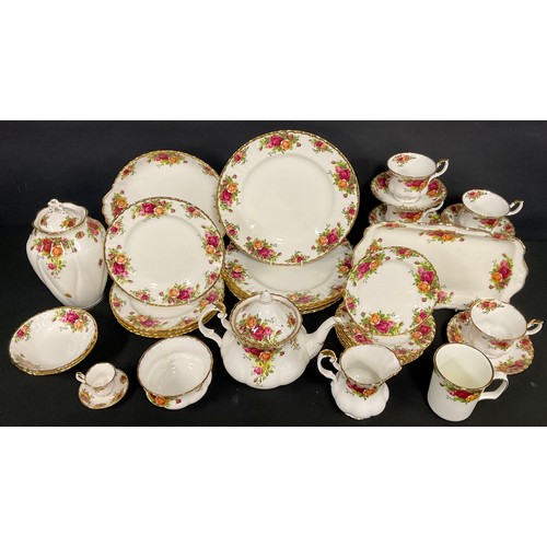 87 - A Royal Albert Old Country Roses dinner and tea service for six, comprising teapot, saucers, cups, d... 