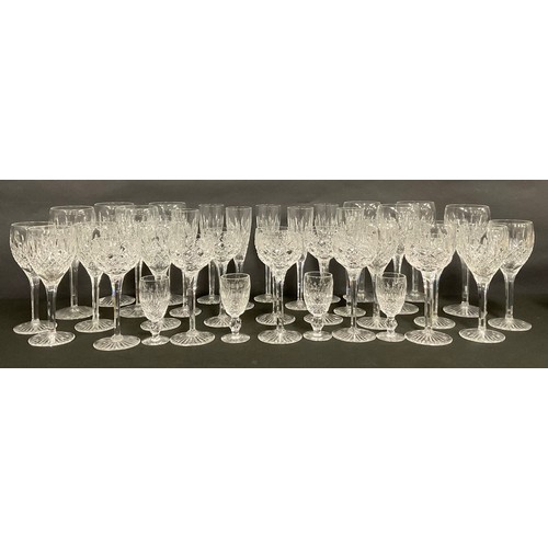 93 - Glassware - Stuart Crystal cut glass part suite of drinking glasses, including champagne flutes, hoc... 