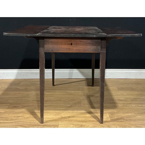 566 - A George III mahogany Pembroke table, rounded rectangular top with fall leaves, above a frieze drawe... 