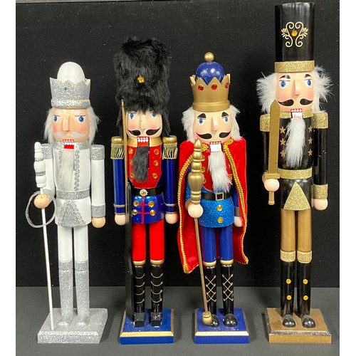 567 - Nutcrackers - painted wooden novelty lever action nutcrackers each as traditional soldier figures/ki... 