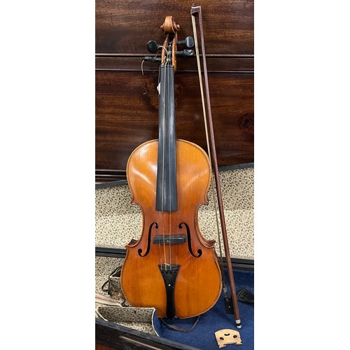 117 - A 3/4 three quarter size violin, well figured two-piece back, after Antonius Stradivarius, cased.