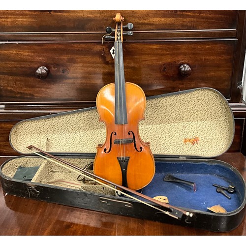 117 - A 3/4 three quarter size violin, well figured two-piece back, after Antonius Stradivarius, cased.