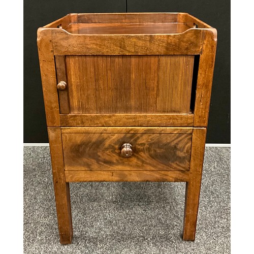 126 - A George III mahogany night cupboard, the galleried tray top above a tambour door and draw-out base,... 