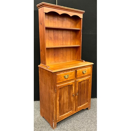 154 - A pine farmhouse dresser, of small and neat proportions, 168.5cm high x 82cm wide x 41cm deep.