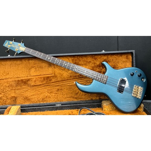 188 - A 1980s Aria Pro II electric bass guitar, electric blue, serial no 3086012, hard cased with leads, t... 