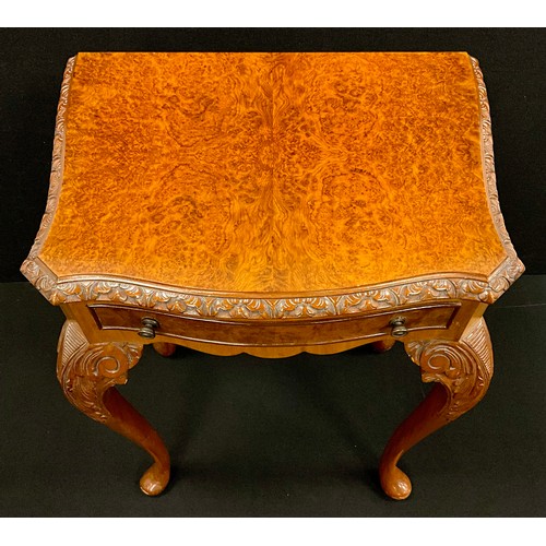 191 - A Georgian style walnut and burr walnut serpentine lamp table, well-figured burr walnut top, with a ... 