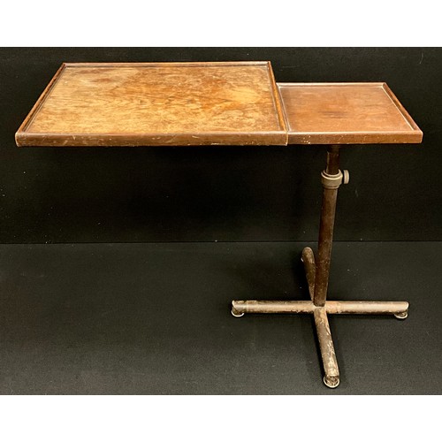 193 - A Francois Caruelle ‘modifiable’ writing / reading table, cast iron adjustable base, with rise-and f... 