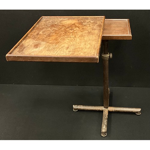 193 - A Francois Caruelle ‘modifiable’ writing / reading table, cast iron adjustable base, with rise-and f... 