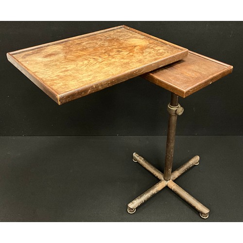 193 - A Francois Caruelle ‘modifiable’ writing / reading table, cast iron adjustable base, with rise-and f... 