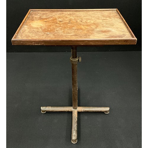 193 - A Francois Caruelle ‘modifiable’ writing / reading table, cast iron adjustable base, with rise-and f... 