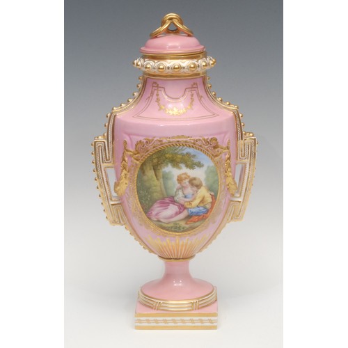 7 - A Coalport porcelain pedestal urnular two handled vase and cover, finely painted in the Watteauesque... 