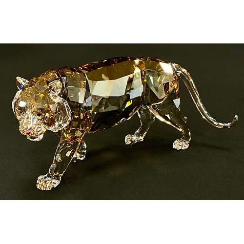 41 - Swarovski crystal, from The Endangered Wildlife series, ‘Tiger’, coloured crystal model, 19cm long, ... 