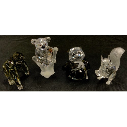 54 - Swarovski model animals including; Koala and baby, 8cm high, Panda with bamboo, 6cm high, baby goril... 