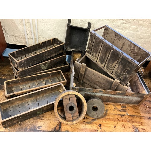 38 - Five 19th century spool trays / drawers;  an early wooden loom drive wheel;  crates, etc.