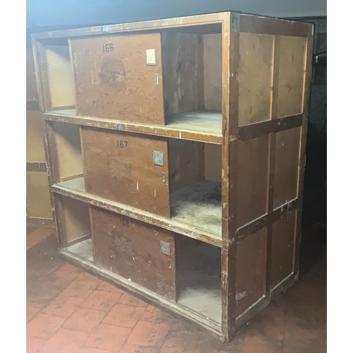 80 - A large pine industrial three tier cabinet, deep frame each layer with single sliding door, 183cm hi... 